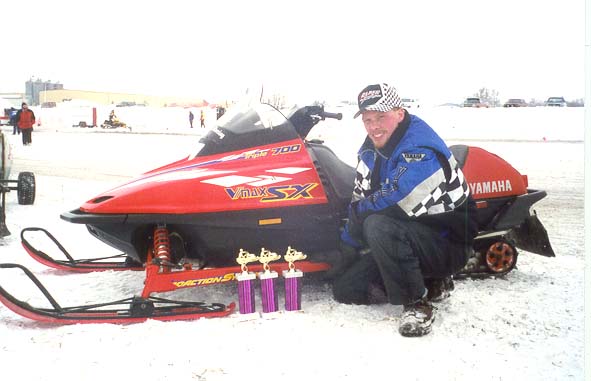 Here I am, with the trophies that the red sled had earned us for the weekend in Valley City.