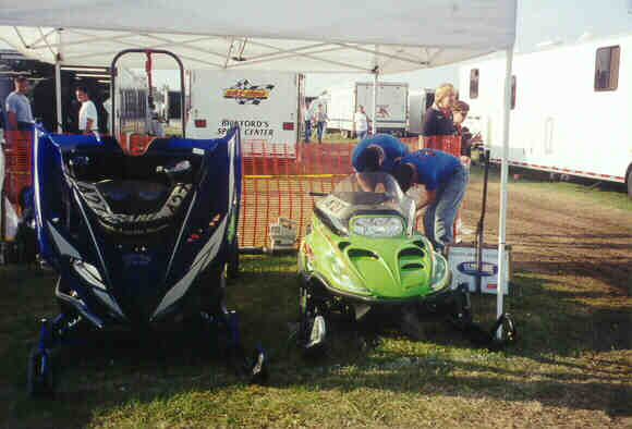 Here we are back at the pits, cooling the blue sled after a test run.  We are getting the Cat (Owned by Dakota Performance) ready to make a test run with it.